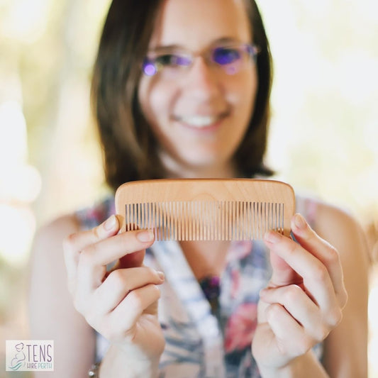 birthing wooden comb